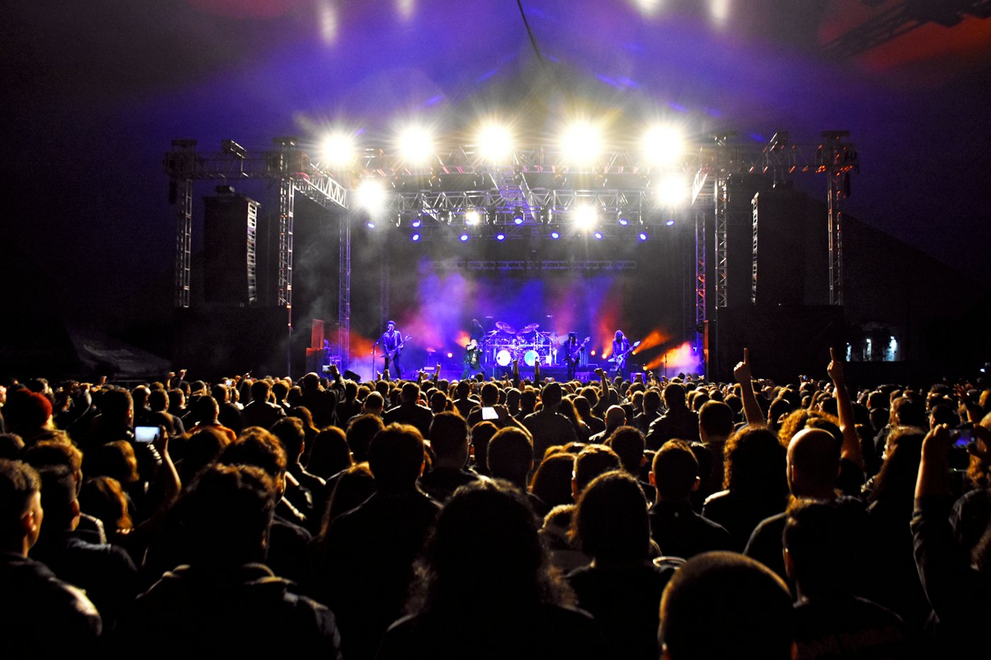 Concert crowd under stage lights
